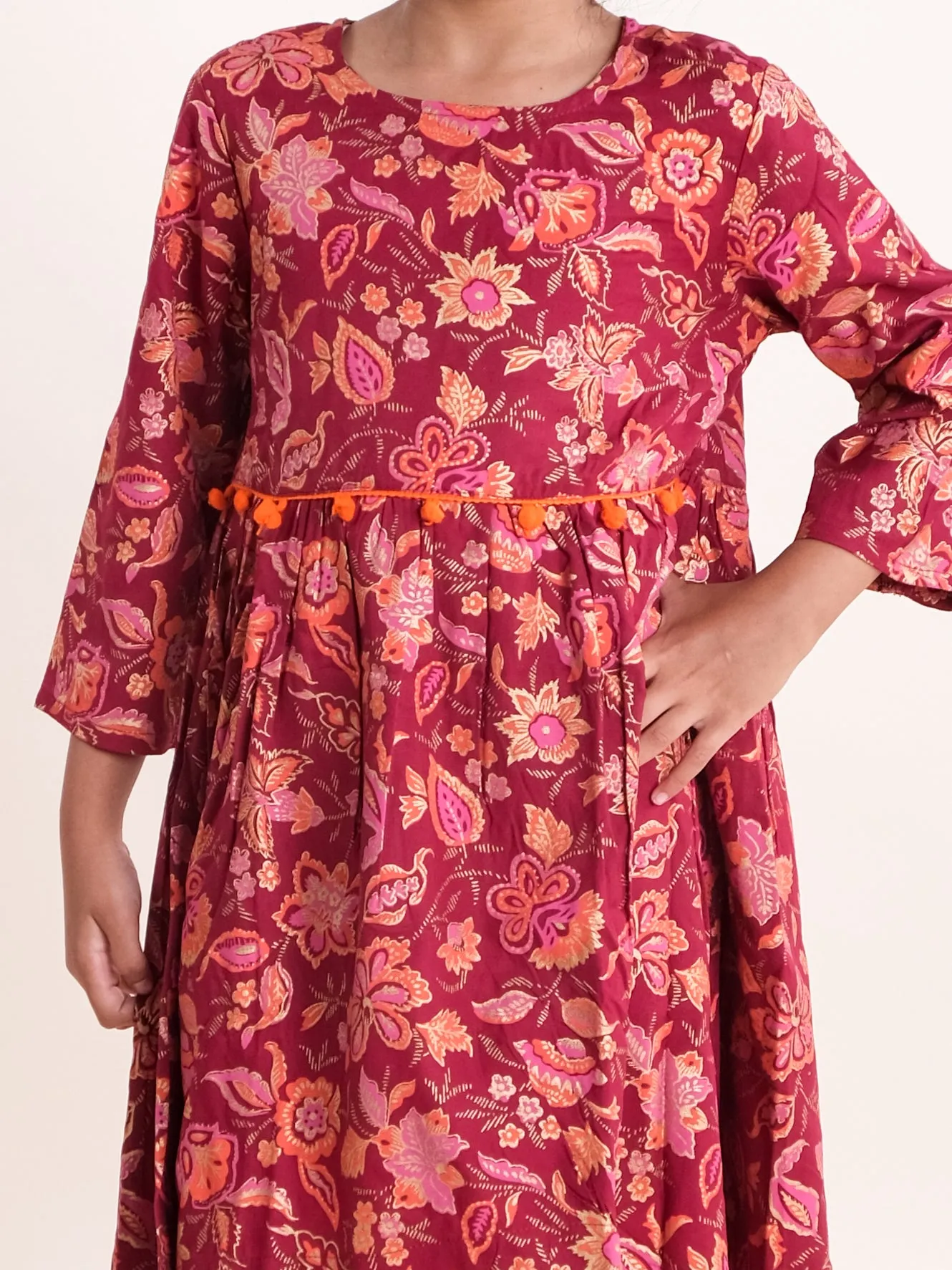 Girls Asymmetric Hem 3/4th Sleeve Kurta With Motif Print Design