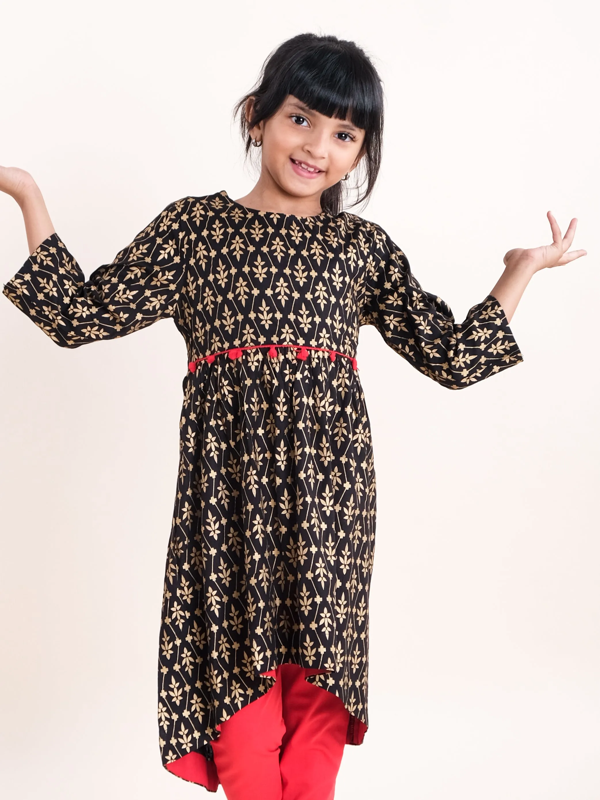 Girls Asymmetric Hem 3/4th Sleeve Kurta With Motif Print Design