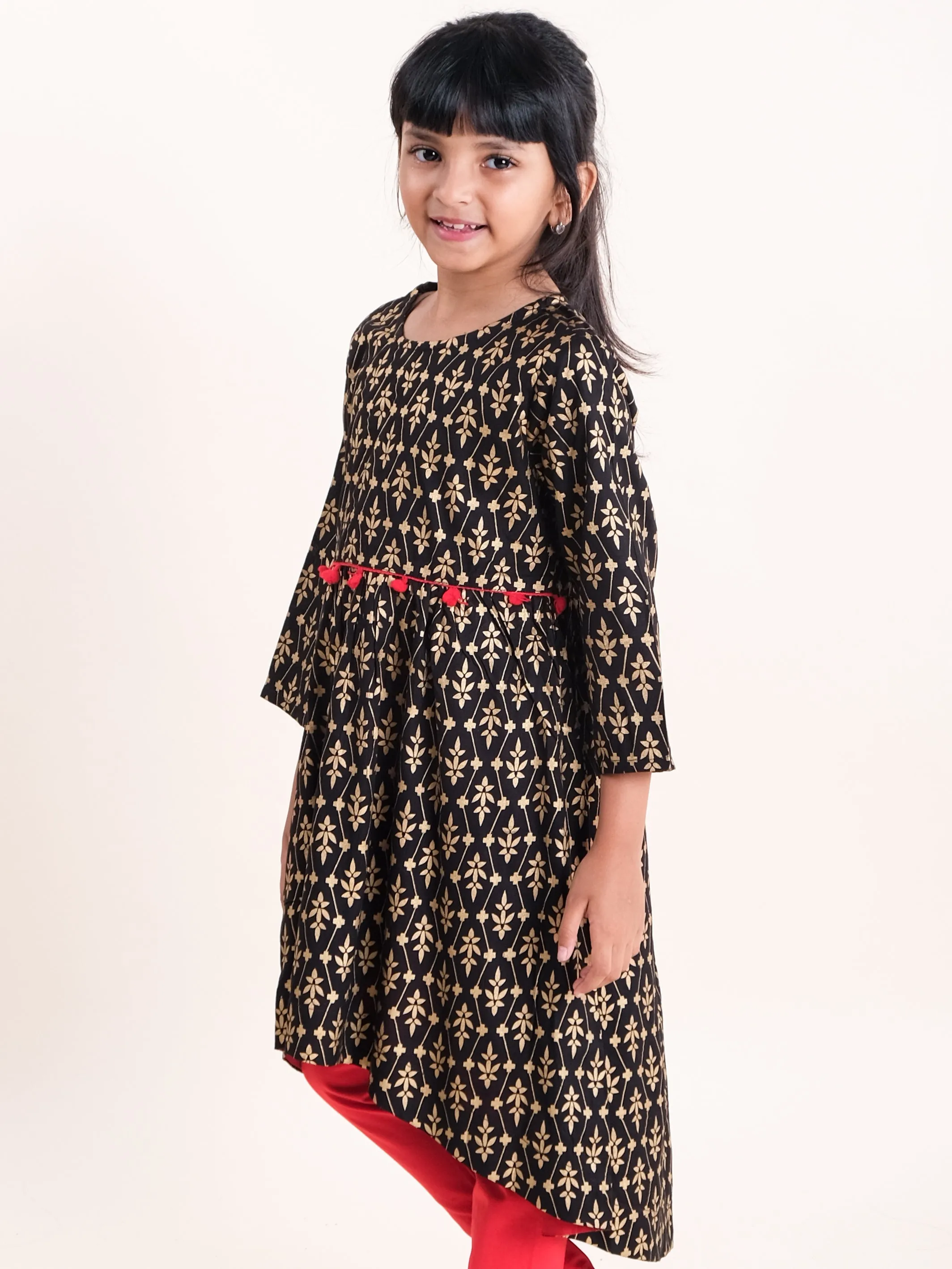 Girls Asymmetric Hem 3/4th Sleeve Kurta With Motif Print Design