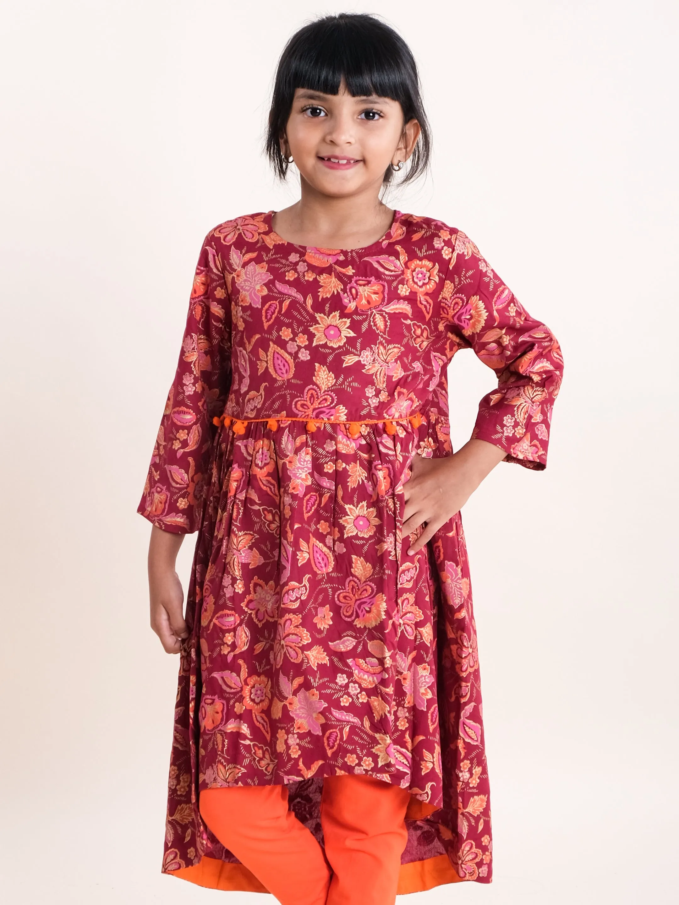 Girls Asymmetric Hem 3/4th Sleeve Kurta With Motif Print Design