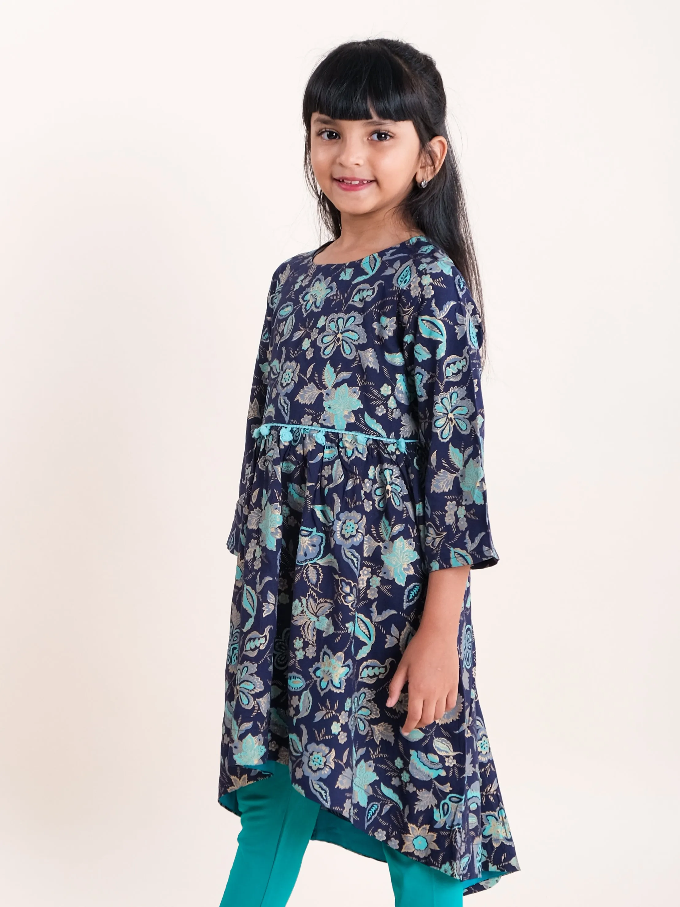 Girls Asymmetric Hem 3/4th Sleeve Kurta With Motif Print Design