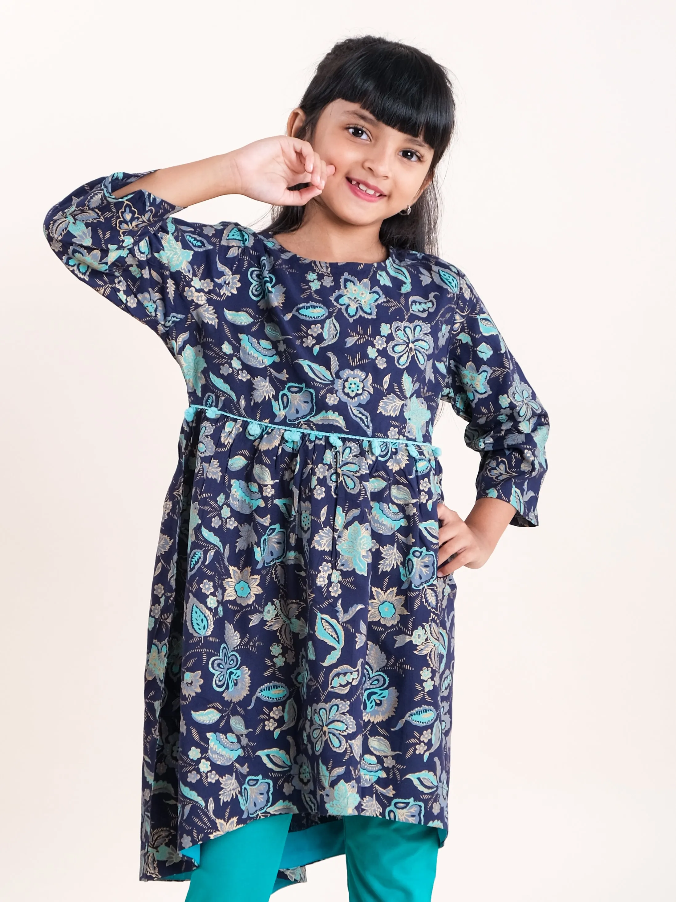 Girls Asymmetric Hem 3/4th Sleeve Kurta With Motif Print Design